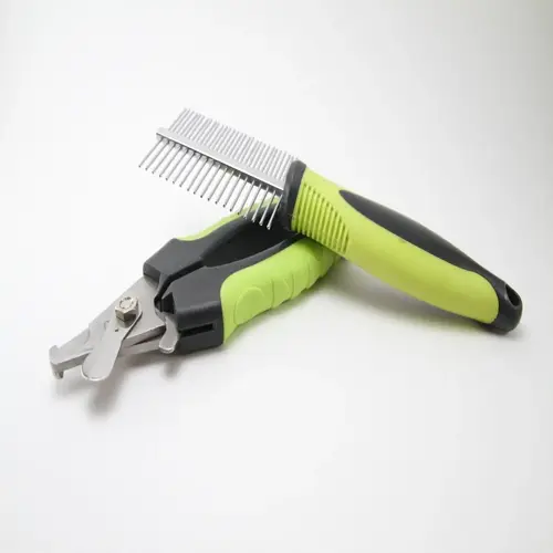 professional pet grooming tools: green-handled nail clippers and a comb on white background