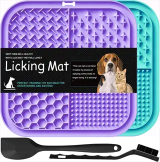 two dog lick mats (purple and teal) with cleaning tools on a product banner labeled 'licking mat' for pet enrichment and training, featuring dog and cat graphics